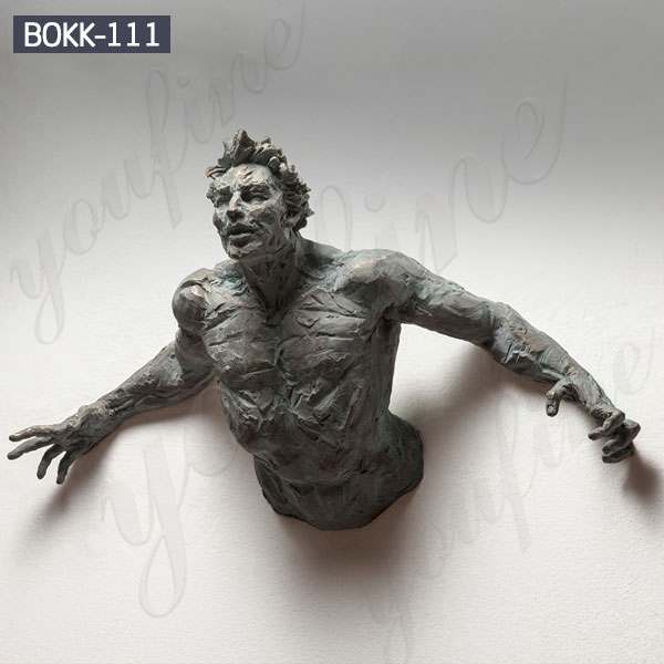 Casting Bronze Matteo Pugliese Sculpture That Emerge from Walls - YouFine News - 1
