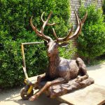 Elegant Crouching Deer Statue