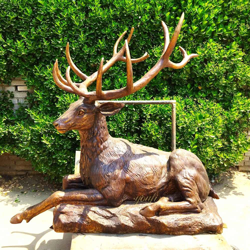 Elegant Crouching and Resting Deer Statue