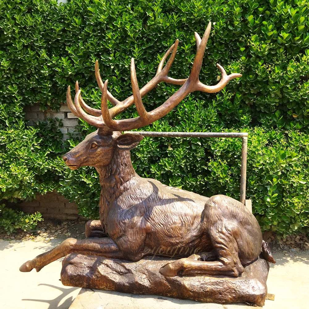 Elegant Resting Deer Statue