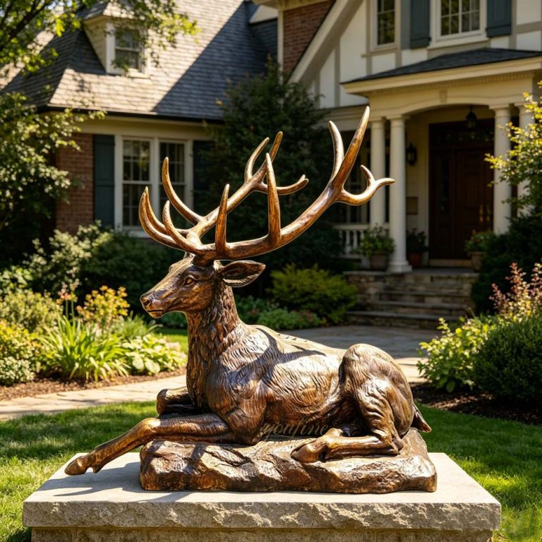Elegant bronze Resting Deer Statue
