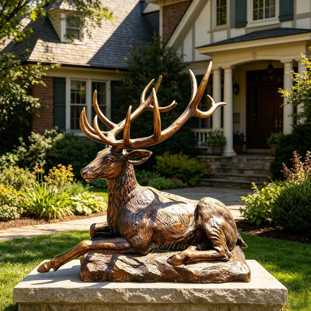 Elegant bronze Resting Deer Statue