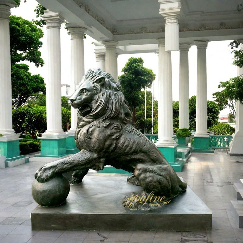 bronze lion statue outside house