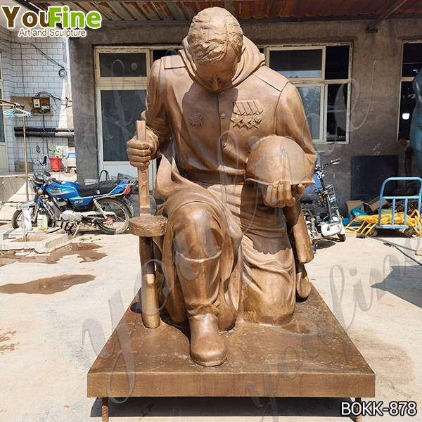 Memorial Bronze Kneeling Soldier Statue at Soviet War