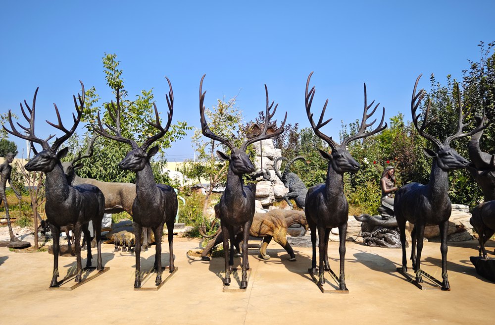 group Life Size Reindeer Statue