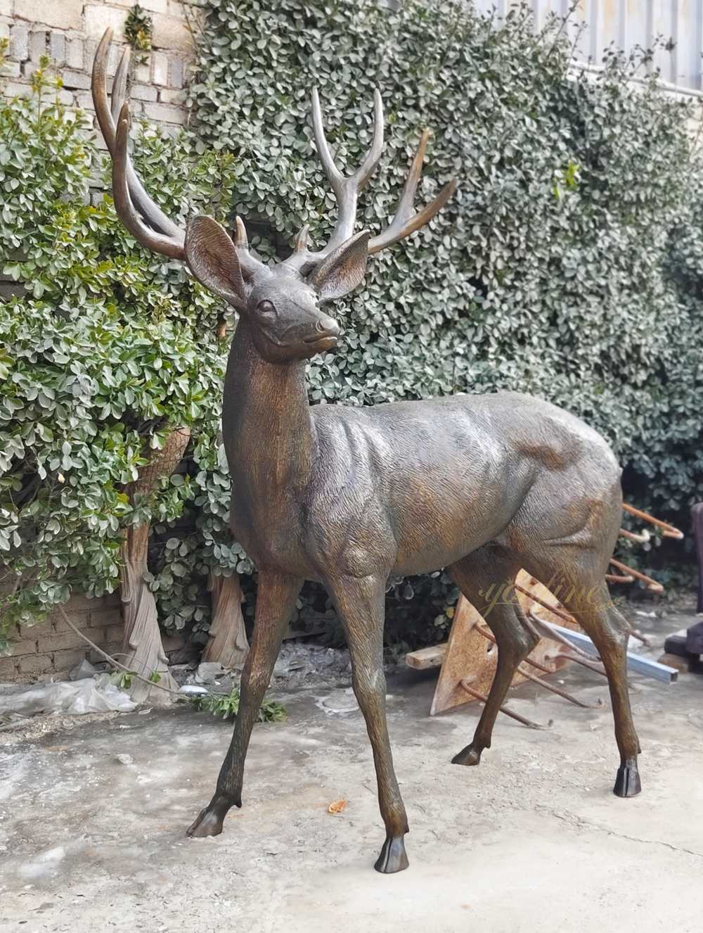 wildlife standing Cerf Sculpture by the Lake