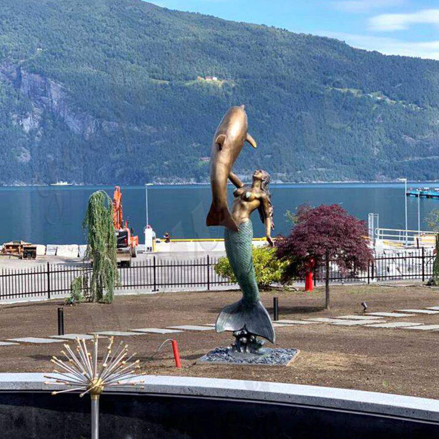 large bronze mermaid statues