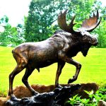Moose Lawn Statue on a Rock in garden