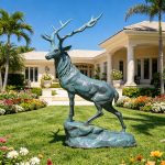 Elk Statues with green patina in the villa garden