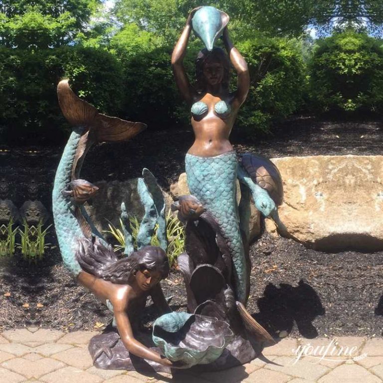 bronze mermaid figurine