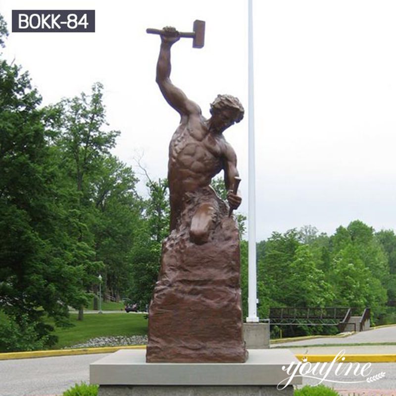 man sculpting himself statue