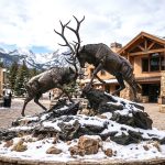 wildlife Bronze Fighting Elk Sculpture in the snow