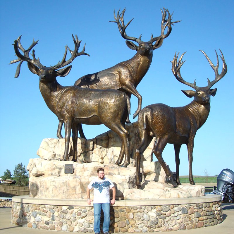 bronze of wildlife mule deer outside Cabela's