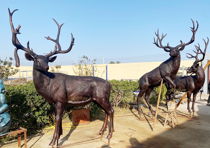 three wildlife bronze mule deer sculpture