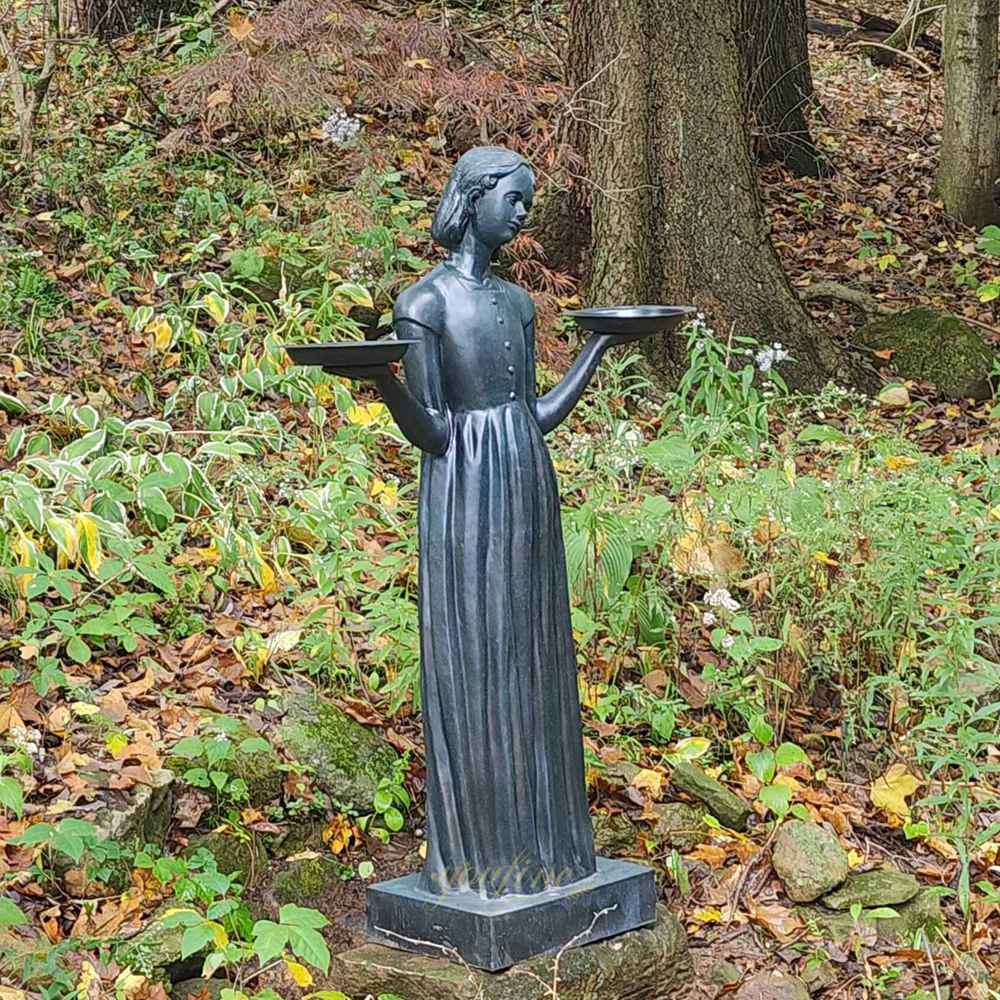 This is feedback from a US client showing the Bird Lady statue placed in a forest setting.
