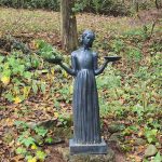 feedback from a US client showing the Bird Lady statue placed in a forest