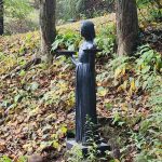 feedback from a US client showing the bronze Bird Lady statue placed in a forest