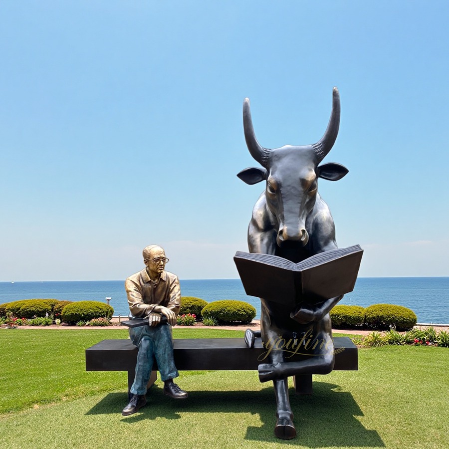 bronze Sitting Bull Statue with man