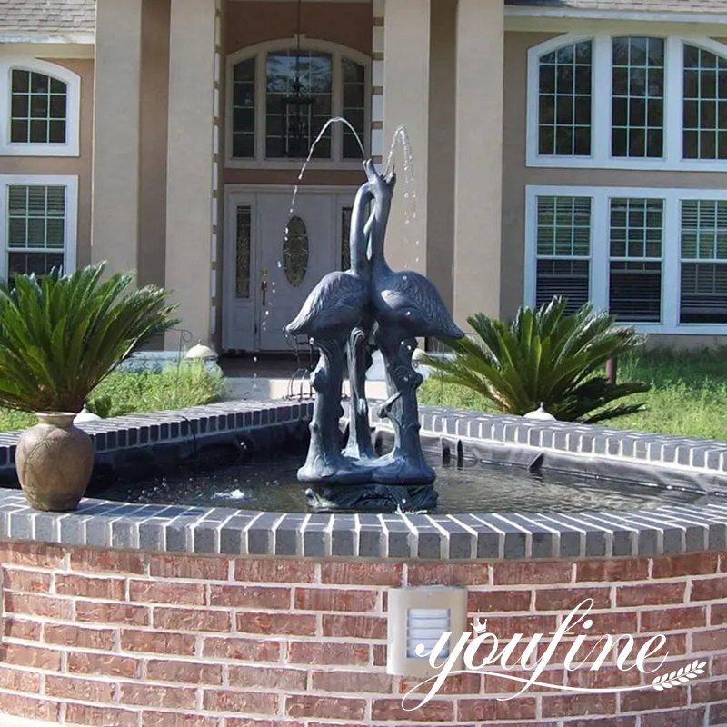 bronze crane fountain statue