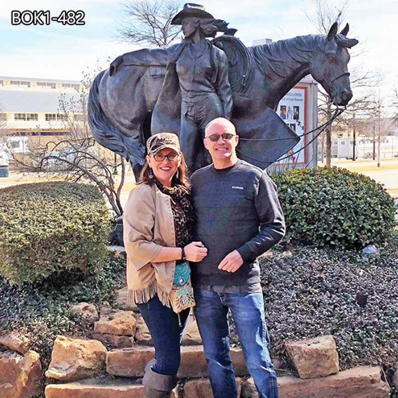 Cowgirl bronze statue