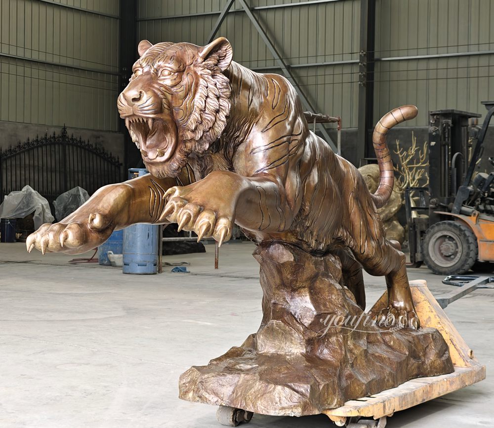 wildlife leaping tiger sculpture