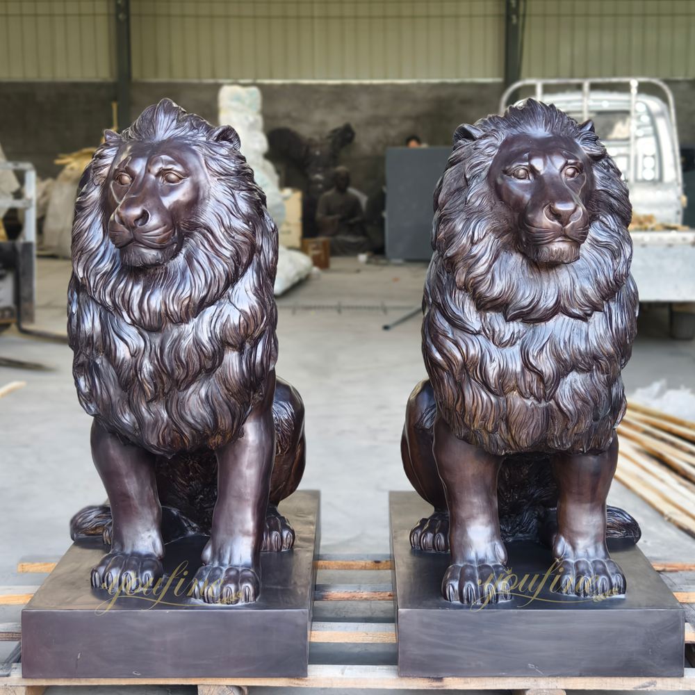 Brown crouching lion sculpture