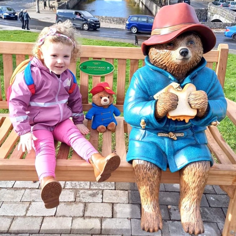 Lifesize paddington bear statue with child