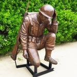 bronze kneeling military figures