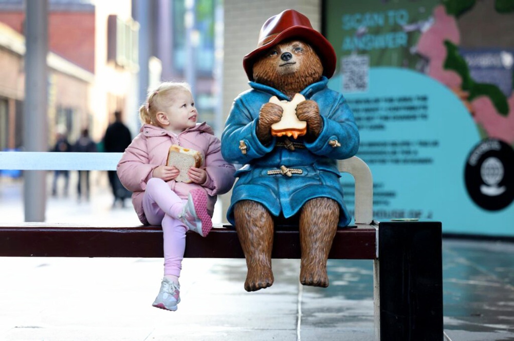 paddington bear with little girl