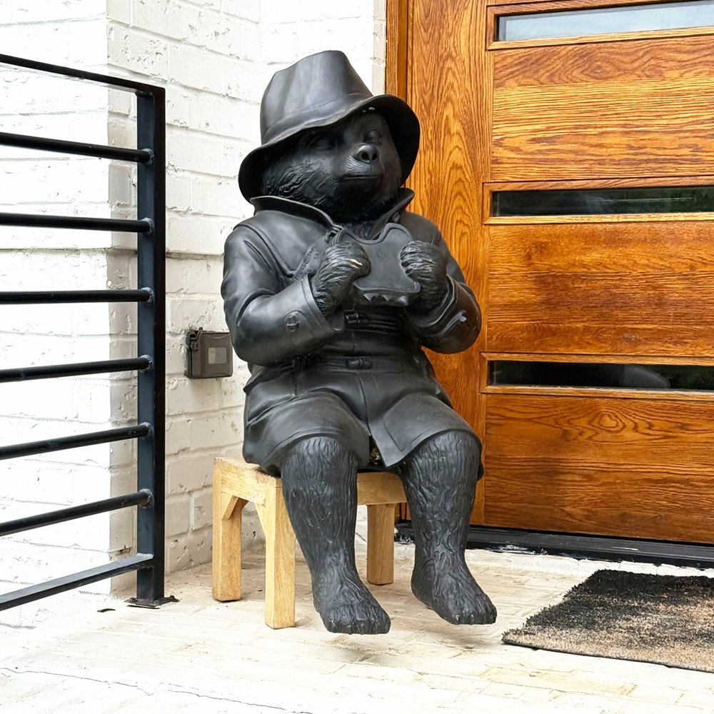 classic bronze paddington bear statue doorway feedback