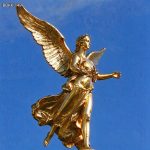 Side view golden bronze winged angel sculpture for garden project
