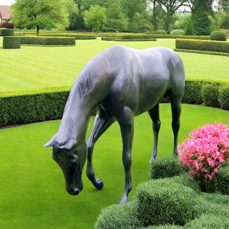 Black grazing horse statue