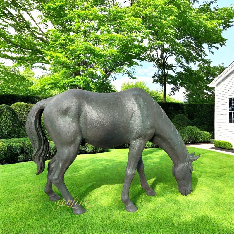 Grazing horse statue