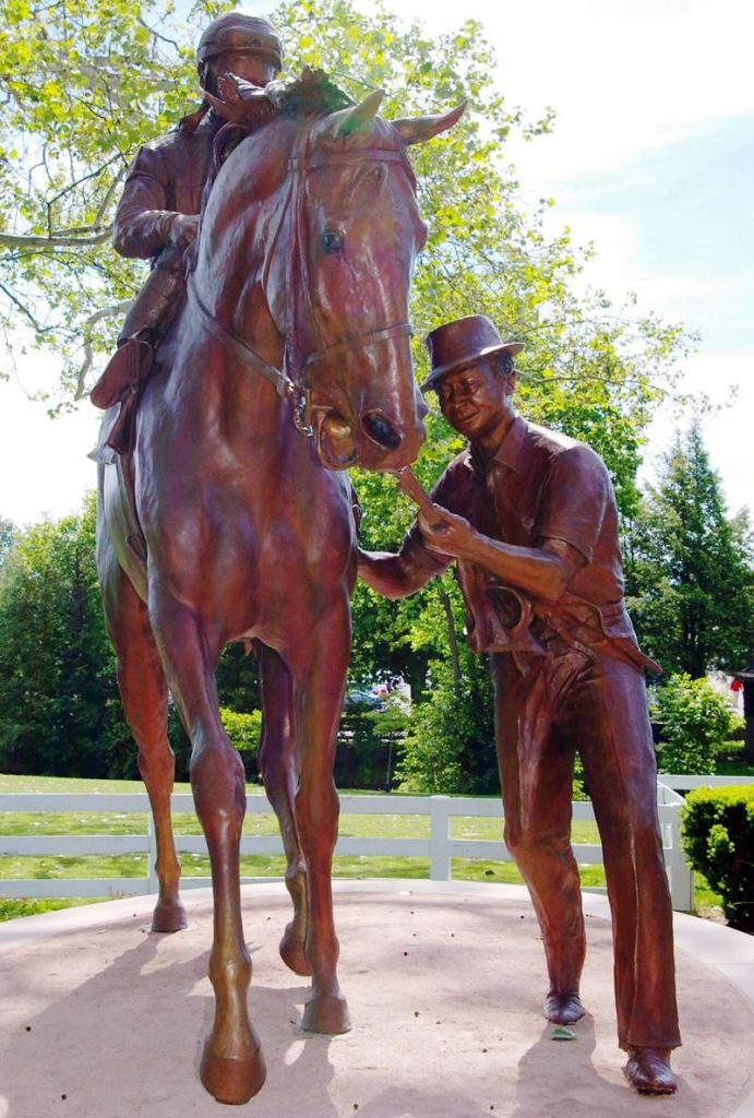life-size horse and jockey bronze statue