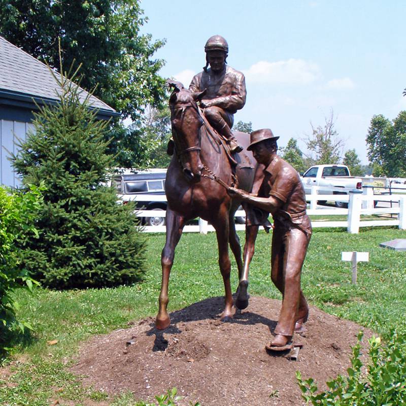 life-size horse and jockey sculpture art