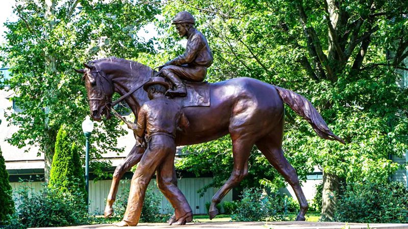 life-size horse and jockey statue