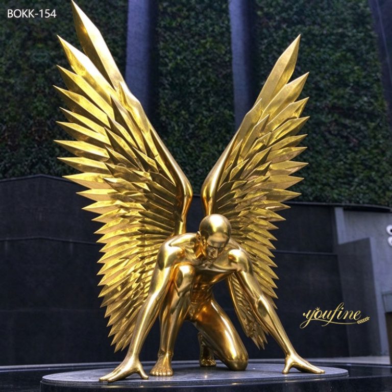 Large golden winged landscape sculpture