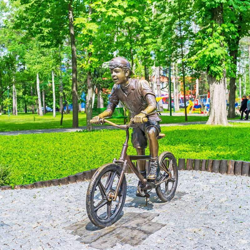 Life Size Bronze Children Statue School Boy Biking Adventures Factory Wholesale - Bronze Children Statues - 1