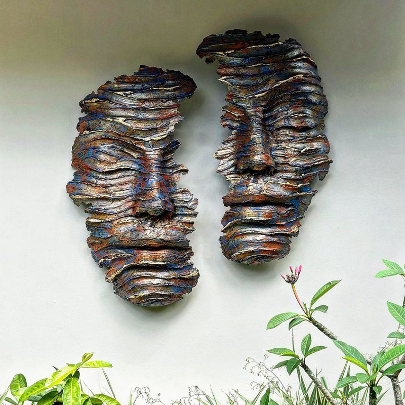 bronze face sculpture