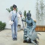 outdoor bronze poseidon statue