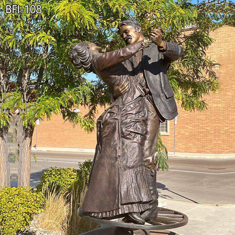 dancing couple statue