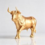 golden brown highland bull statue