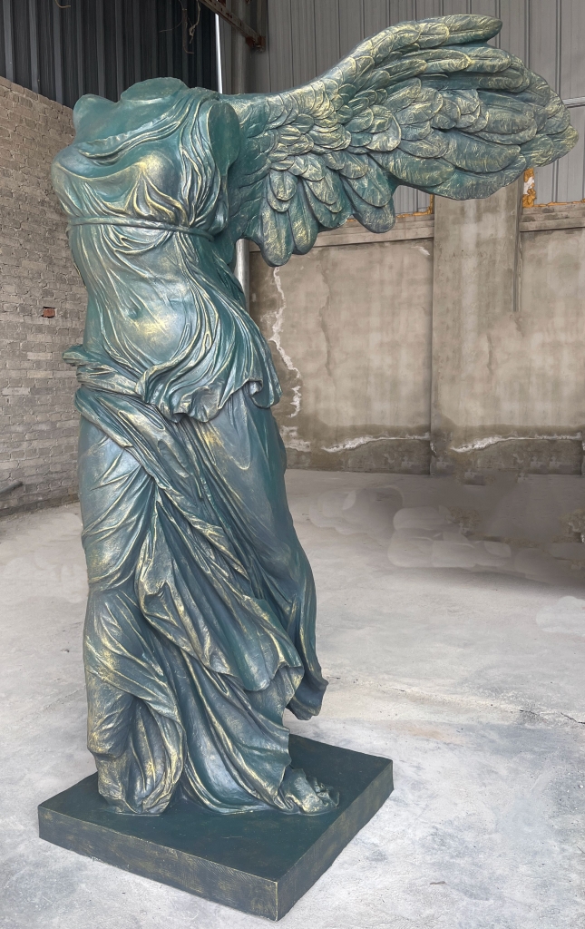 Blue-green statue of the goddess of victory