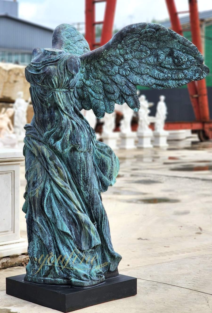 Dark blue statue of the goddess of victory