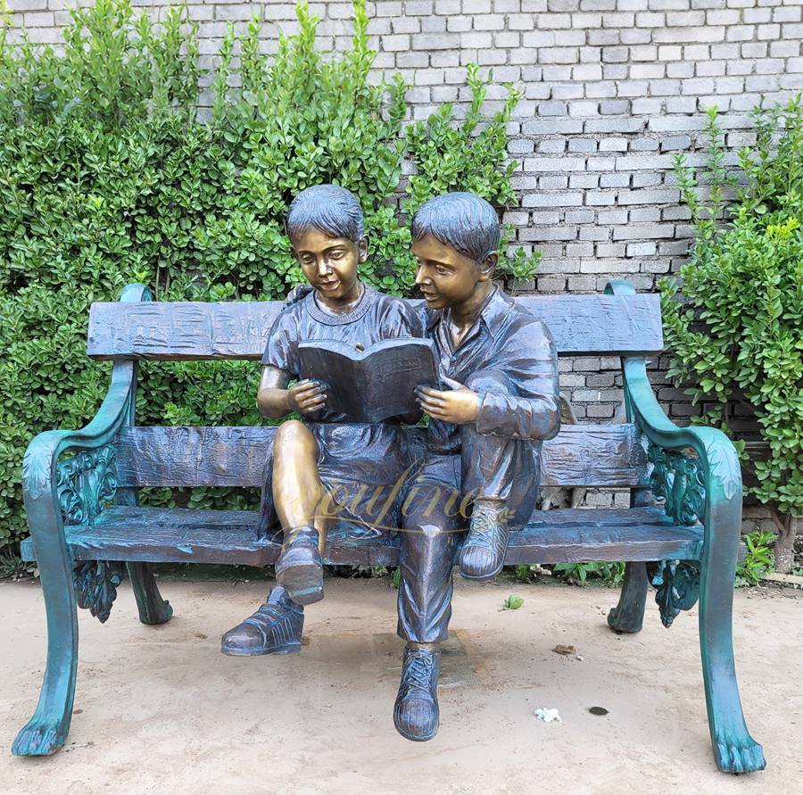 Sculpture of a child reading