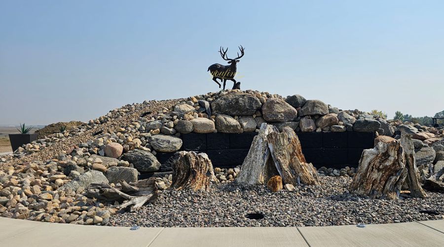 Sculpture of a leaping white-tailed deer