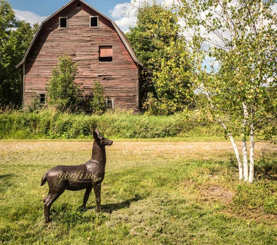 Standing white-tailed deer sculpture