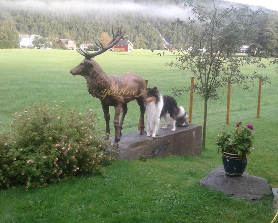 bronze Deer sculpture standing in a daze