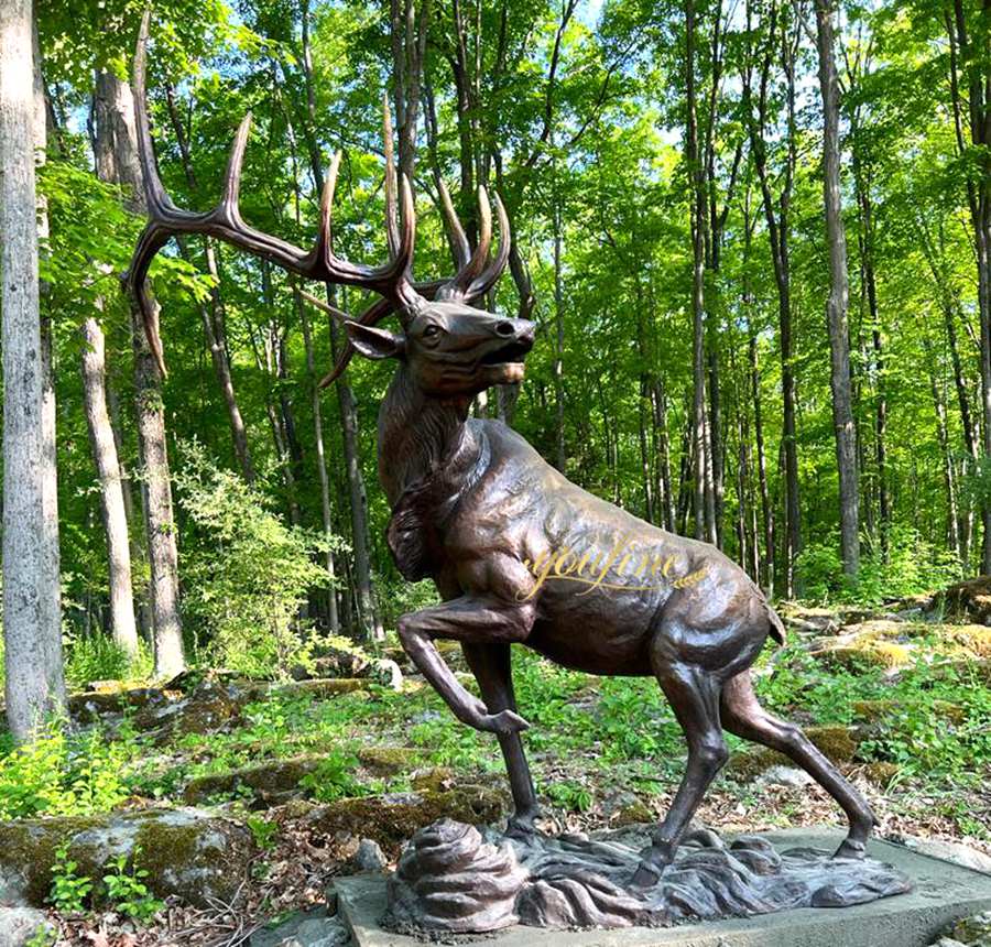deer looking back with its legs raised