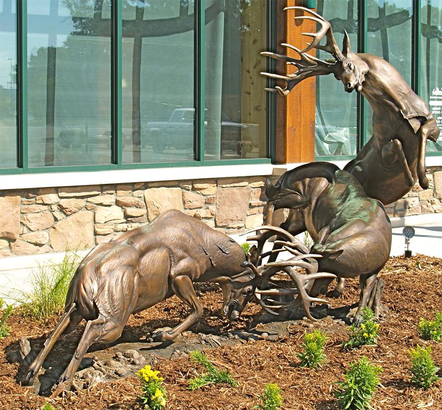 The Symbolic Meaning of Deer Sculptures in World Culture - Blog - 17 group Hunting Deer statues